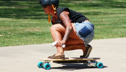 Courtney Webb riding the Evolve Electric Skateboard