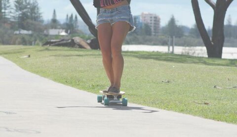 Courtney Webb riding the Evolve Electric Skateboard