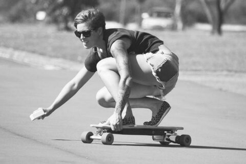 Courtney Webb riding the Evolve Electric Skateboard